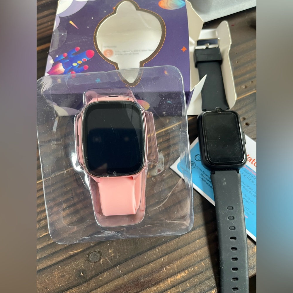 Kids smart watch. Lot of 2. Pink and black. Brand new in box